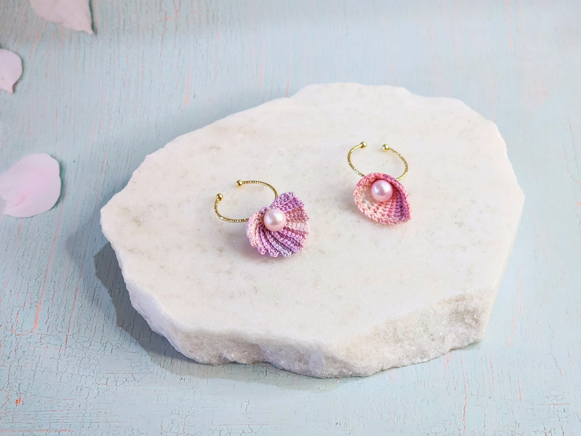 Handcrafted micro-crochet seashell rings with lustrous natural freshwater pearls on 14K gold-plated adjustable rings