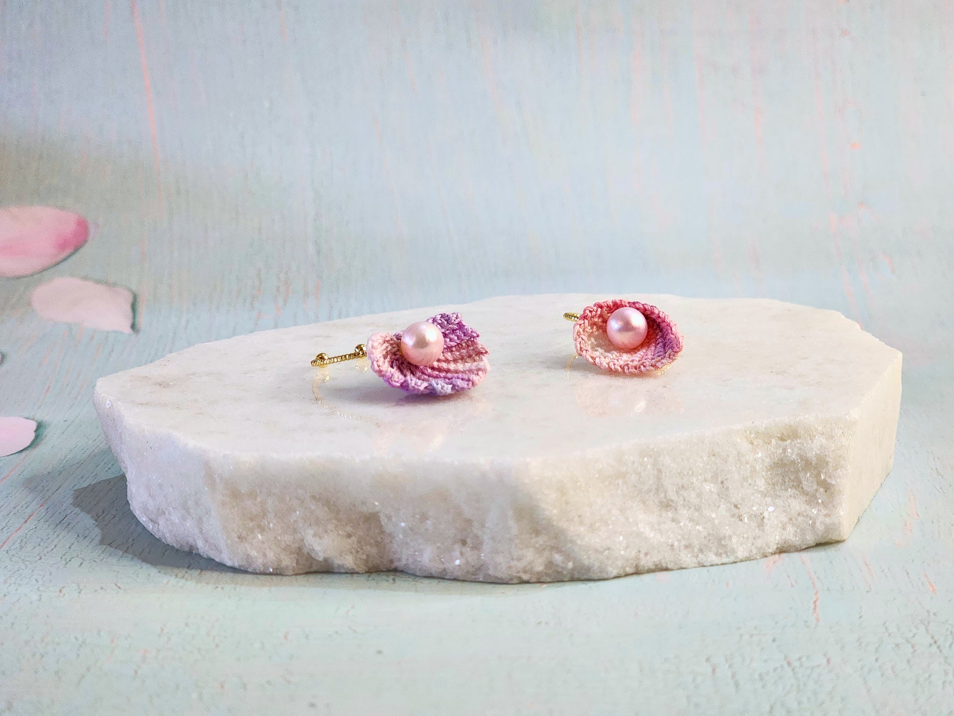 Handcrafted micro-crochet seashell rings with lustrous natural freshwater pearls on 14K gold-plated adjustable rings