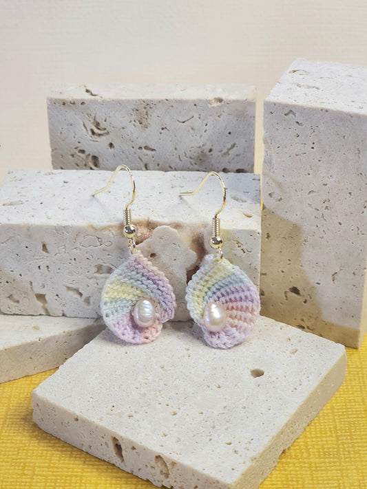 A pair of limited edition micro-crochet seashell with real baroque pink pearls earrings