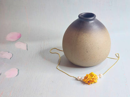 Handcrafted micro-crochet star flower cluster flanked by 6-7mm, nearly round, natural freshwater pearls. Accented with Miyuki glass beads.