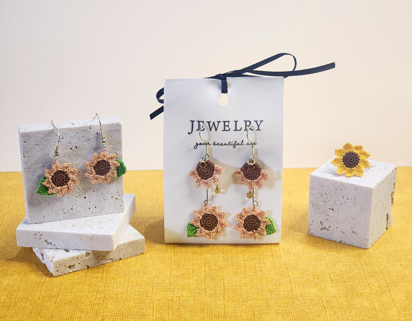 A pair of limited edition micro-crochet sunflower drop earrings